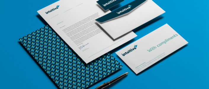 Telecom brand stationery suite including letterhead, envelope and compliment slip for