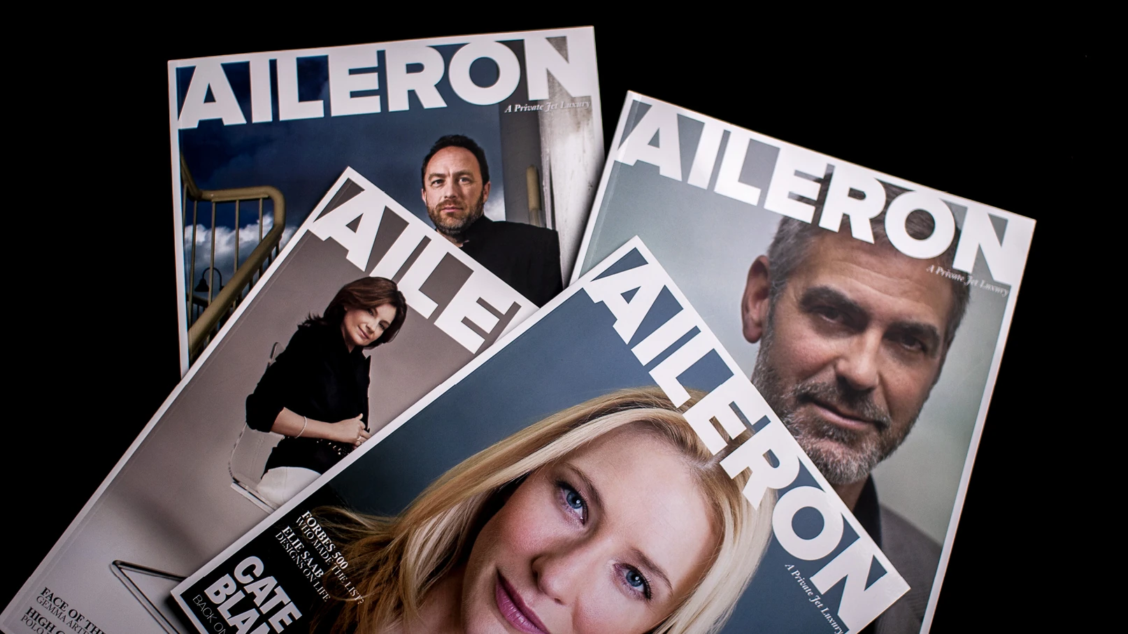 Collection of Aileron private jet magazine covers featuring celebrity and executive portraits