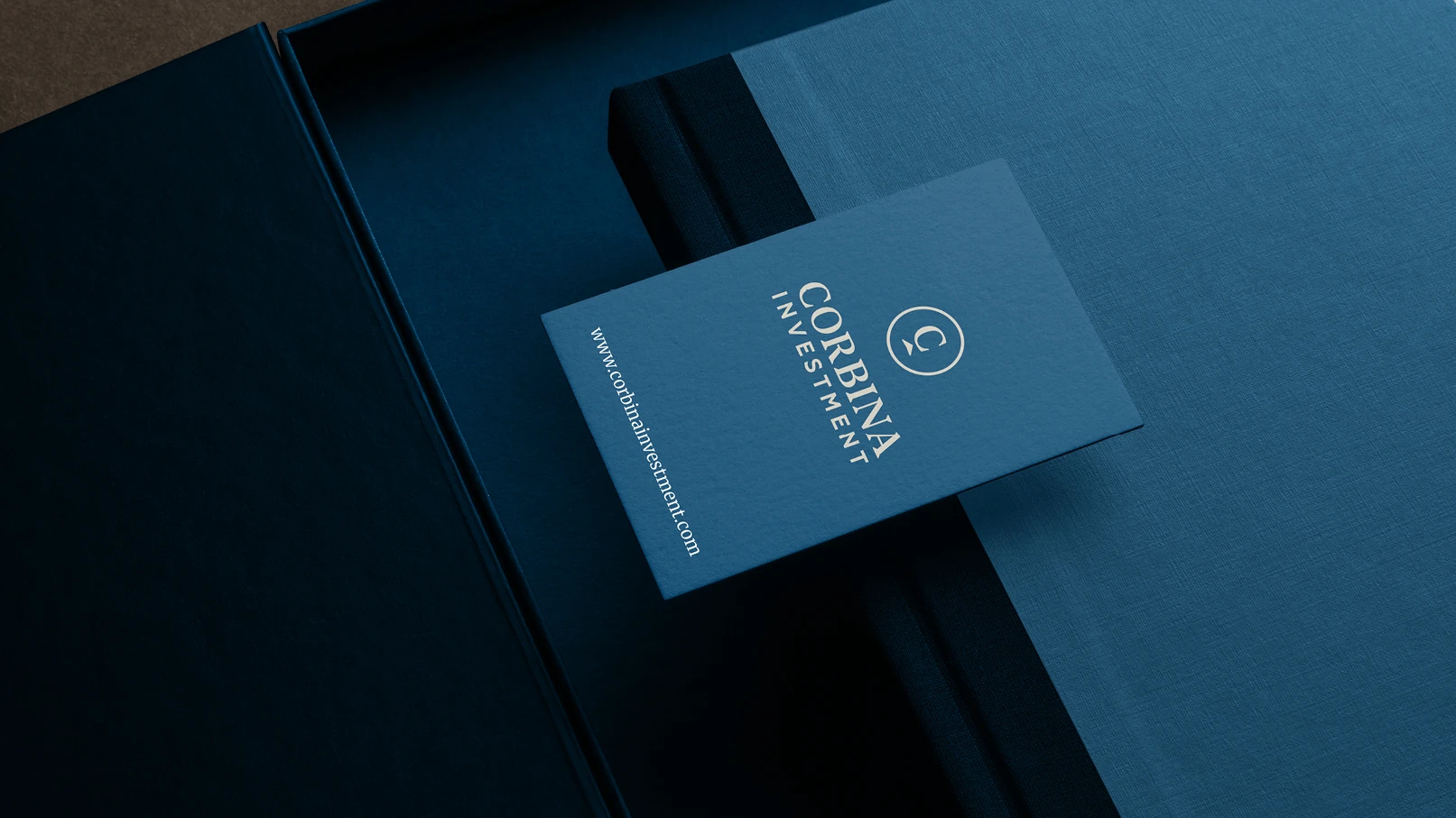 Corbina Investment corporate branding applied to executive stationery and presentation materials
