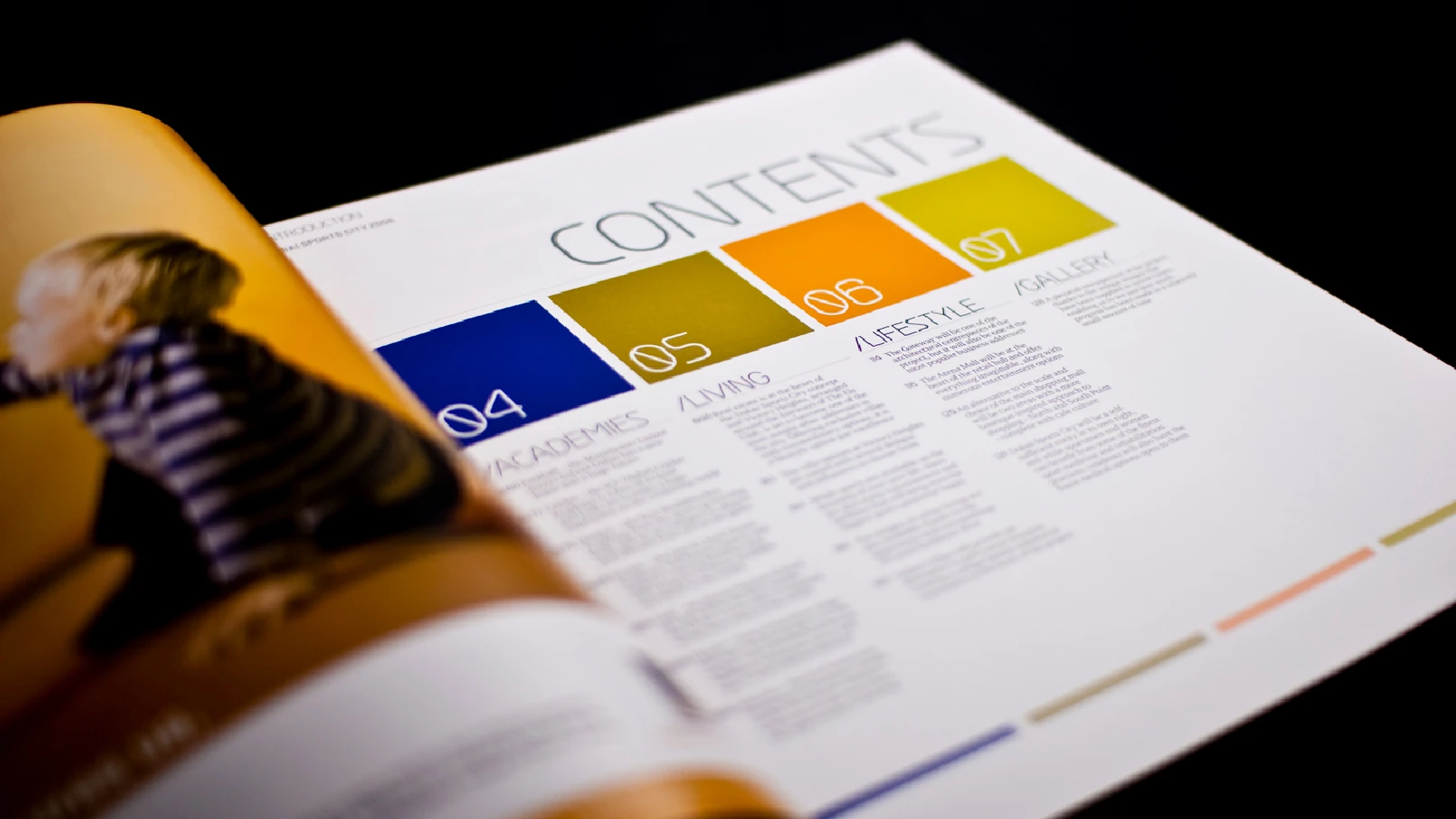 Dubai Sports City editorial contents spread with academy and lifestyle sections