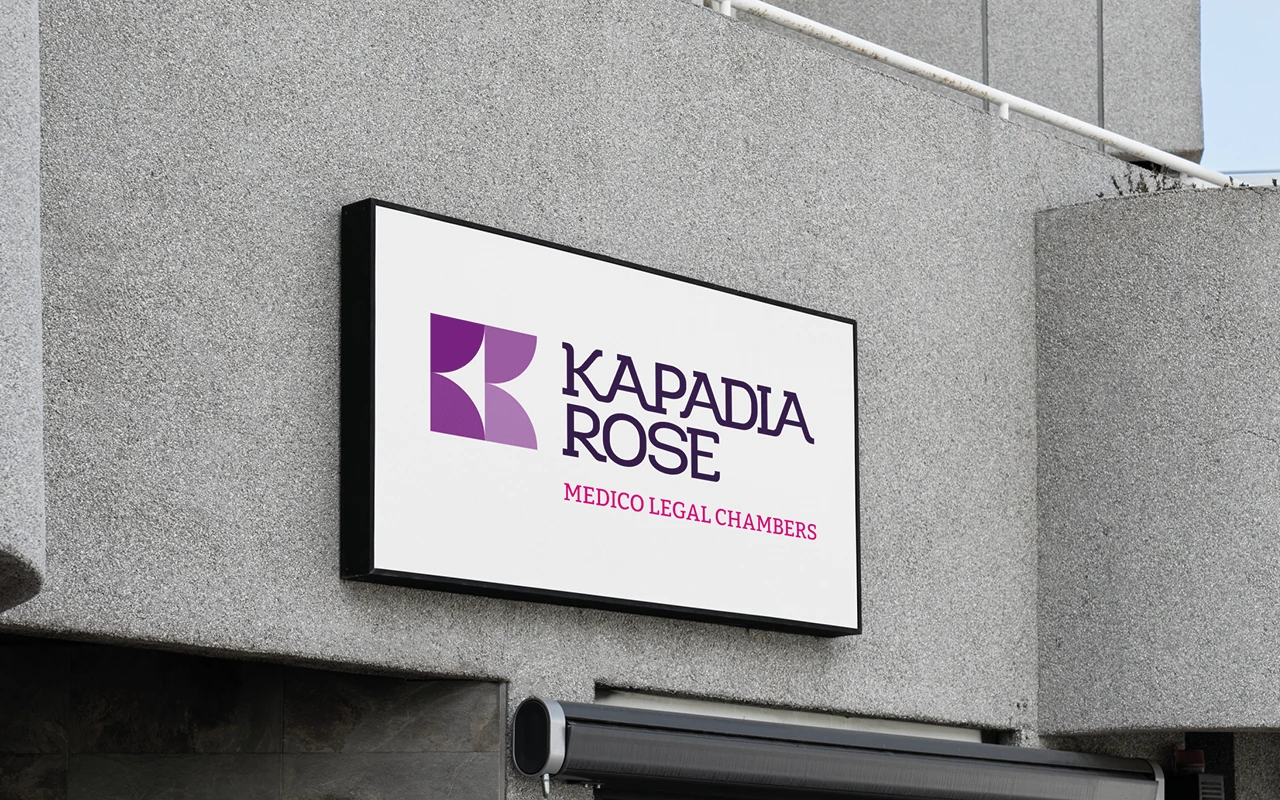 Kapadia Rose signage displayed on an exterior building sign