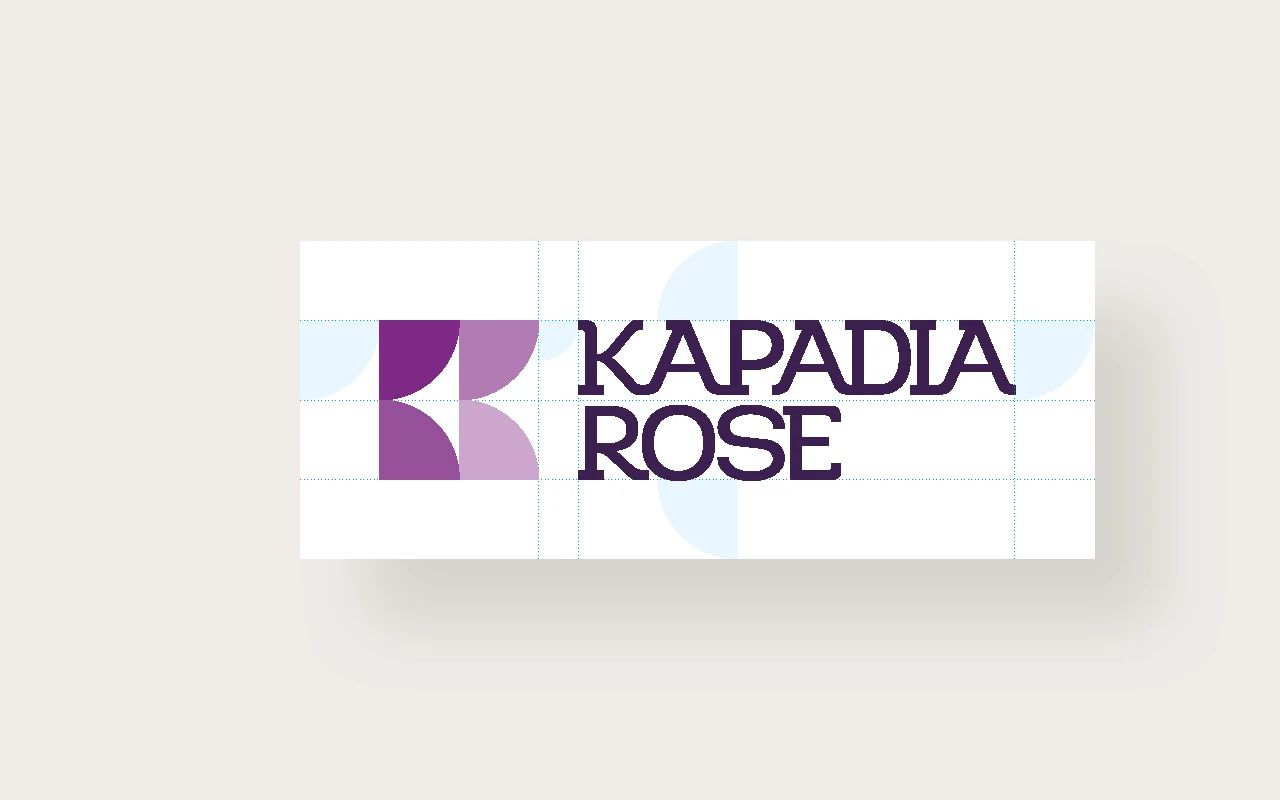 Kapadia Rose logo shown on a grid to illustrate proportions and spacing