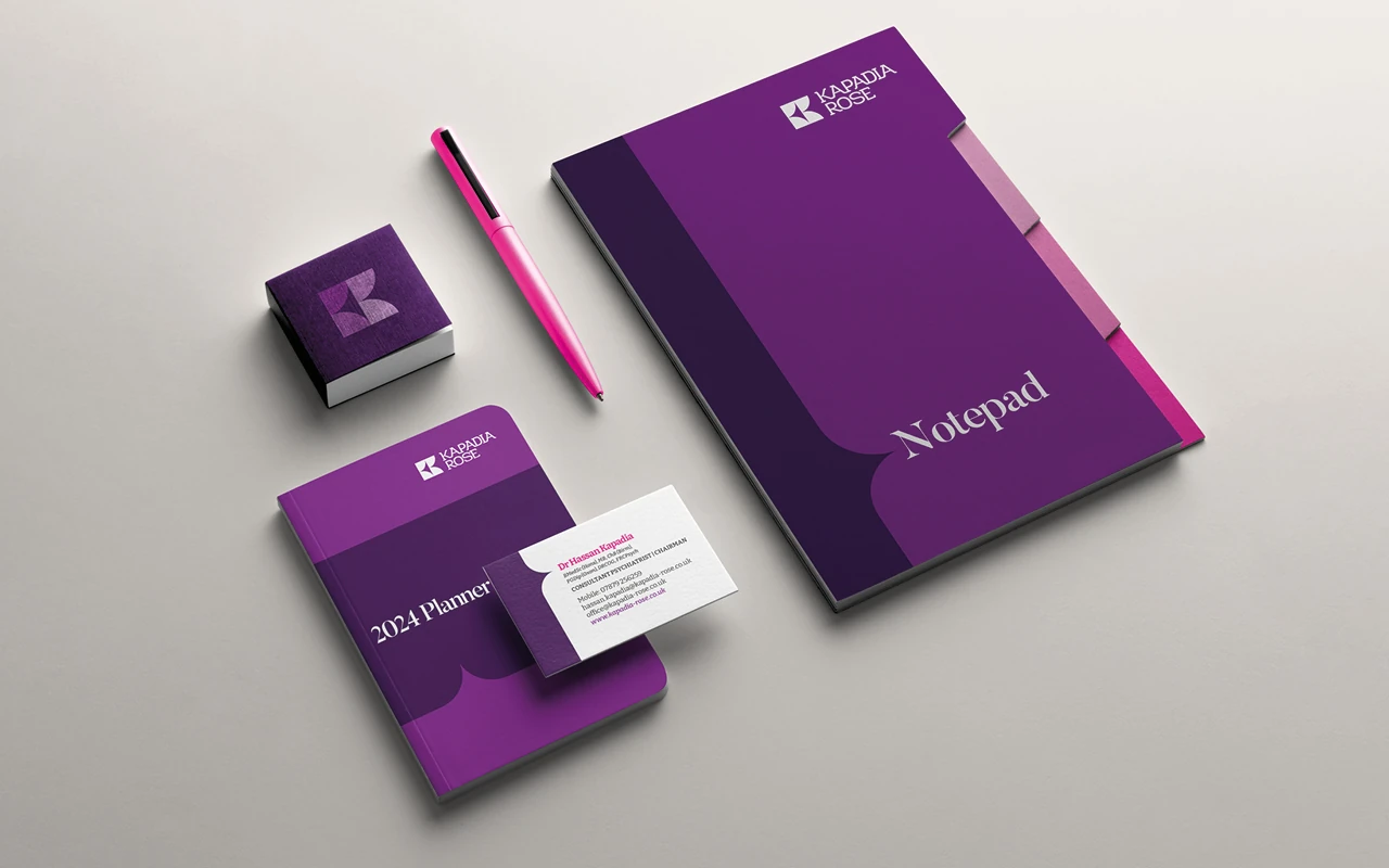 Kapadia Rose stationery set with planner, notepad, and business cards.