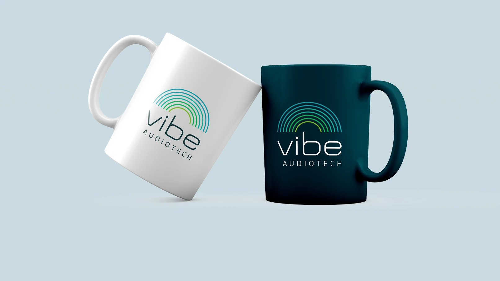 Vibe Audiotech brand identity design mockups including logo applications on mugs and stationery